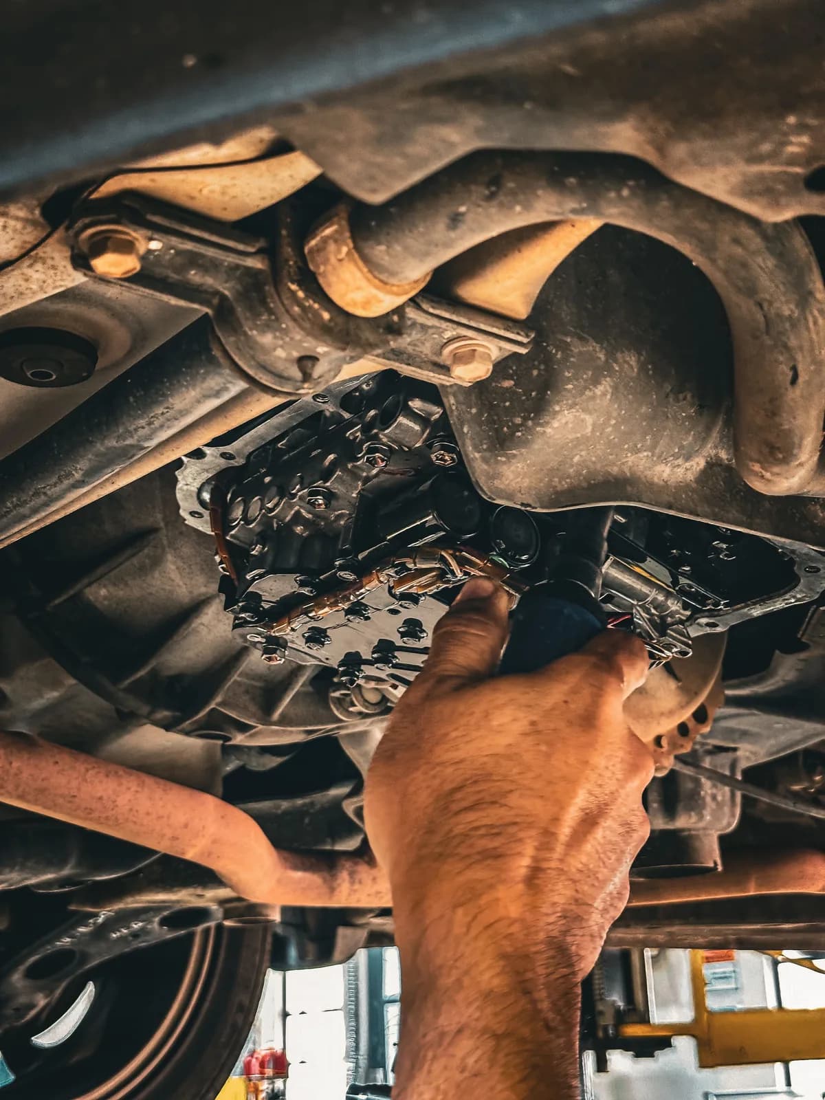 Transmission valve body repair underneath a vehicle